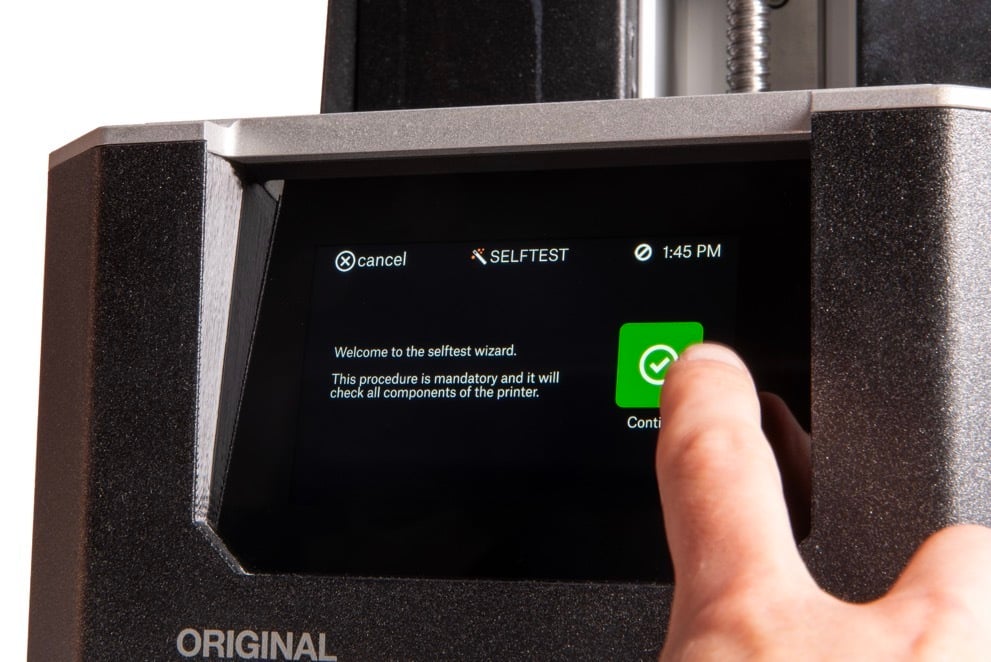 Miniatures of chess pieces next to a penny for scale